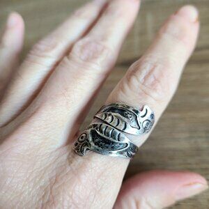 Sterling silver ring with parrots design.